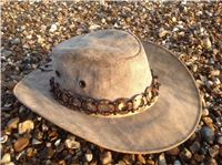 Tarp hats on pebbles
